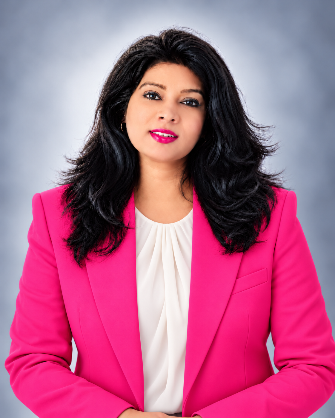 Professional portrait of Dr. Bindu Bodanapu in a pink blazer